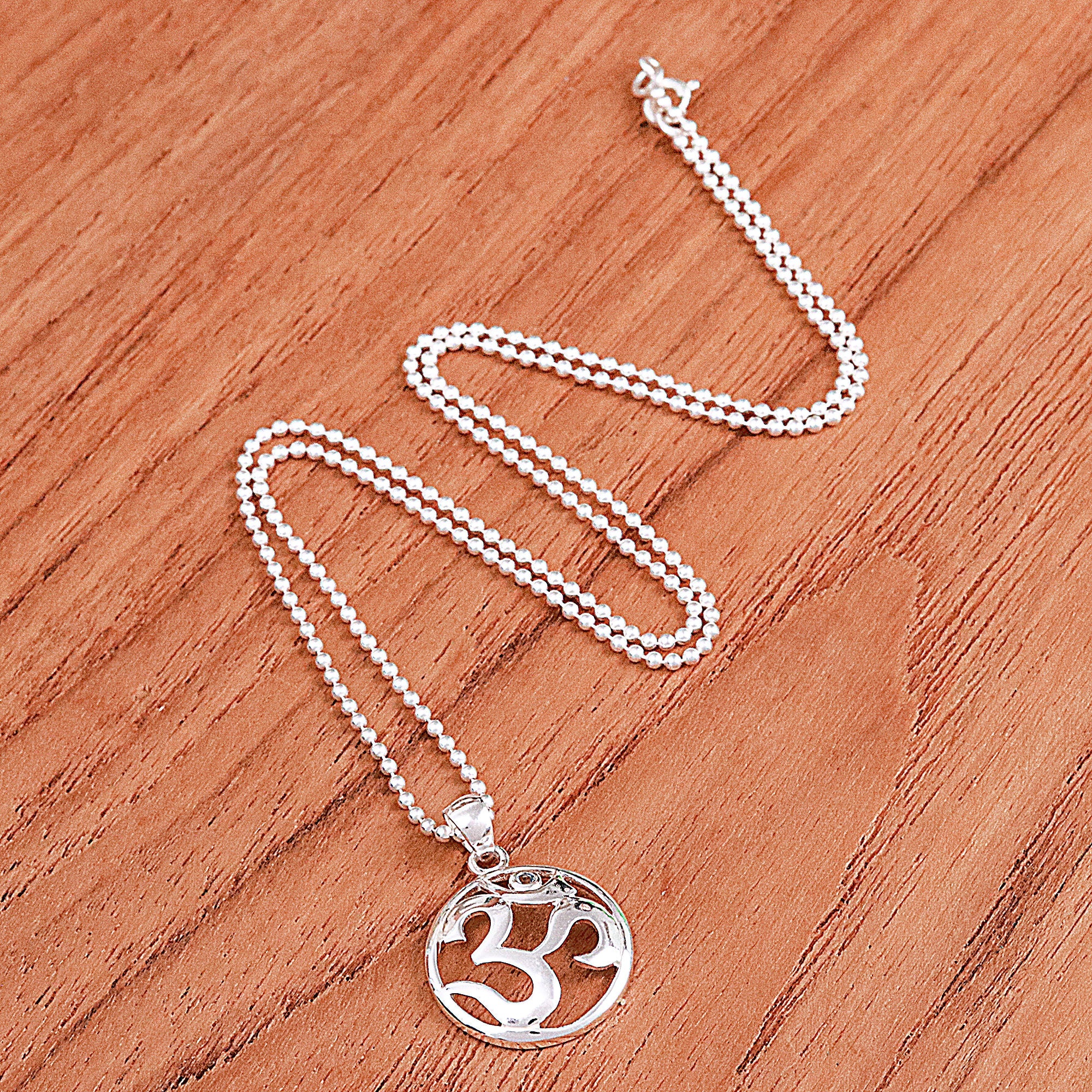 Polished Blue Topaz Round Om Pendant Necklace from Thailand - Om of Loyalty